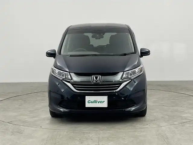 ホンダ フリード ハイブリット EX 愛知県 2018(平30)年 5.7万km フォレストグリーンパール 純正8インチメモリナビ/（フルセグTV/CD/DVD/BT）/バックカメラ/ハーフレザーシート/前席シートヒーター/ETC/ドラレコ/ワイパーデアイサー/衝突軽減システム/アダプティブクルーズコントロール/レーンキープアシスト/コーナーセンサー/両側パワスラ/純正LEDヘッドライト/純正フロアマット/純正15インチAW/ドアバイザー/エコノミーモード