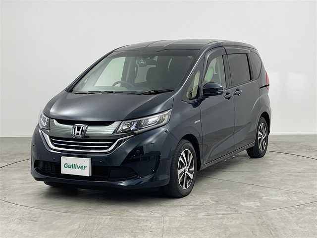 ホンダ フリード ハイブリット EX 愛知県 2018(平30)年 5.7万km フォレストグリーンパール 純正8インチメモリナビ/（フルセグTV/CD/DVD/BT）/バックカメラ/ハーフレザーシート/前席シートヒーター/ETC/ドラレコ/ワイパーデアイサー/衝突軽減システム/アダプティブクルーズコントロール/レーンキープアシスト/コーナーセンサー/両側パワスラ/純正LEDヘッドライト/純正フロアマット/純正15インチAW/ドアバイザー/エコノミーモード