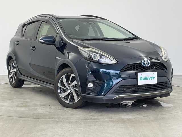 トヨタ アクア クロスオーバー 新潟県 2018(平30)年 6.5万km ブラッキッシュアゲハガラスフレーク 純正メモリナビ【NSZT-W66T】/　フルセグTV/Bluetooth/CD/DVD/衝突被害軽減ブレーキ/レーンキープアシスト/前後コーナーセンサー/ハーフレザーシート/前後ドライブレコーダー/バックモニター/ビルトインETC2.0/LEDヘッドライト/オートマチックハイビーム/オートライト/横滑り防止装置/レザーステアリング/ステアリングスイッチ/禁煙車