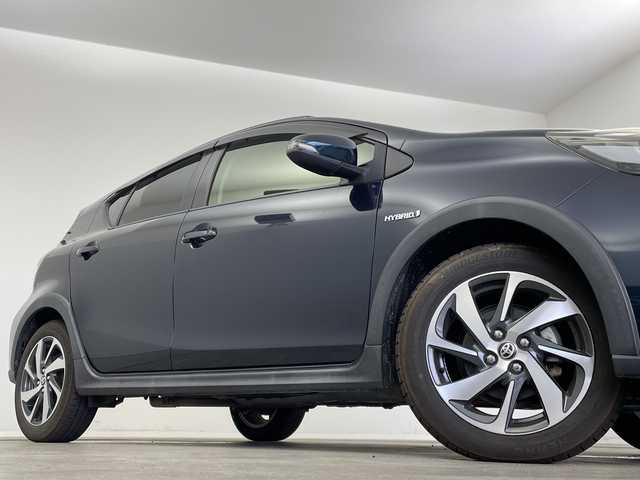 トヨタ アクア クロスオーバー 新潟県 2018(平30)年 6.5万km ブラッキッシュアゲハガラスフレーク 純正メモリナビ【NSZT-W66T】/　フルセグTV/Bluetooth/CD/DVD/衝突被害軽減ブレーキ/レーンキープアシスト/前後コーナーセンサー/ハーフレザーシート/前後ドライブレコーダー/バックモニター/ビルトインETC2.0/LEDヘッドライト/オートマチックハイビーム/オートライト/横滑り防止装置/レザーステアリング/ステアリングスイッチ/禁煙車