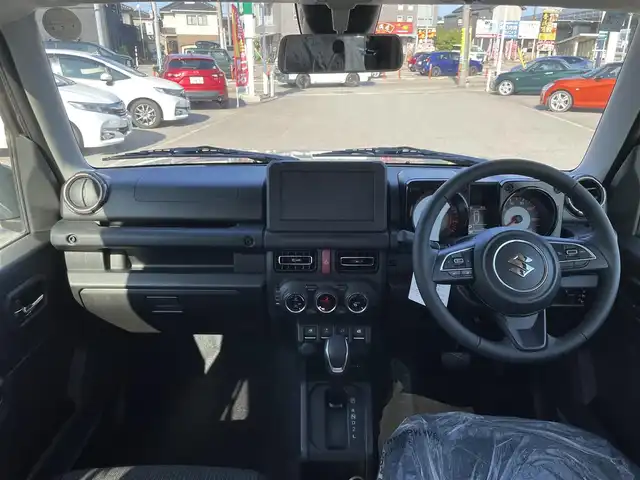 スズキ ジムニー XC 石川県 2025(令7)年 0.1千km ミディアムグレー 届出済未使用車/LEDヘッドライト/純正アルミホイール/スマートキー/プッシュスタート/電動ミラー/シートヒーター/スズキセーフティ/クルーズコントロール/保証書