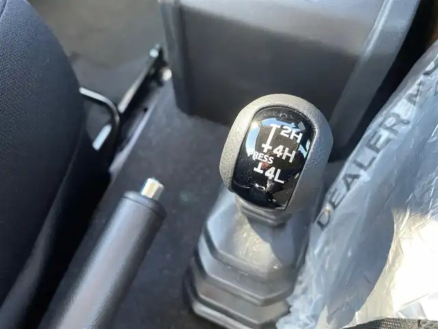スズキ ジムニー XC 石川県 2025(令7)年 0.1千km ミディアムグレー 届出済未使用車/LEDヘッドライト/純正アルミホイール/スマートキー/プッシュスタート/電動ミラー/シートヒーター/スズキセーフティ/クルーズコントロール/保証書