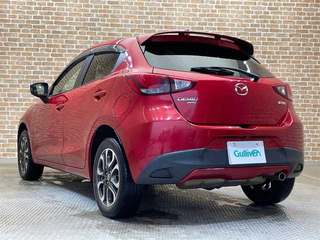 マツダ デミオ XD ツーリング Lパッケージ 秋田県 2015(平27)年 2.8万km ソウルレッドプレミアムメタリック ワンオーナー/４WD/ディーゼルターボ/スマートシティブレーキサポート/クルーズコントロール/ヘッドアップディスプレイ/横滑り防止装置/パドルシフト/アイドリングストップ/純正ナビ/フルセグTV/ステアリングスイッチ/バックカメラ/ETC/ドライブレコーダー/LEDヘッドライト/フォグランプ/純正16インチアルミホイール