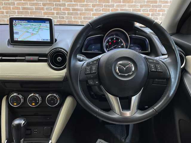 マツダ デミオ XD ツーリング Lパッケージ 秋田県 2015(平27)年 2.8万km ソウルレッドプレミアムメタリック ワンオーナー/４WD/ディーゼルターボ/スマートシティブレーキサポート/クルーズコントロール/ヘッドアップディスプレイ/横滑り防止装置/パドルシフト/アイドリングストップ/純正ナビ/フルセグTV/ステアリングスイッチ/バックカメラ/ETC/ドライブレコーダー/LEDヘッドライト/フォグランプ/純正16インチアルミホイール