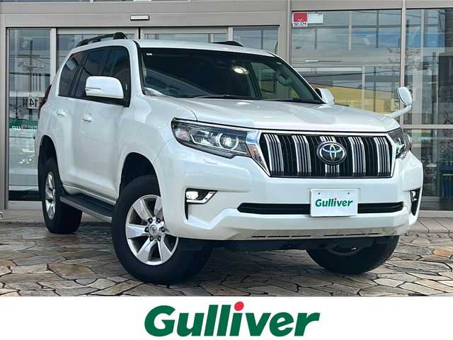 トヨタ ランドクルーザー プラド TX 静岡県 2019(平31)年 4.2万km ホワイトパールクリスタルシャイン ナビ/・ラジオ/フルセグTV/・ipod/SD/USB/Bluetooth/ブルーレイ/CD/DVD/主要装備/・レーダークルーズコントロール　/・ドライブレコーダー　/・フリップダウンモニター　/・ＥＴＣ　/・ＬＥＤヘッドライト　/・ブラックルーフレール　/・レーンキープアシスト　/・オートライト　/・オートハイビーム　/・センターデフロック/・ステアリングリモコン/・フルタイム４WD/・LEDヘッドライト/・LEDフォグランプ/・プリクラッシュセーフティー/・プッシュスタート/・スマートキー/・純正アルミホイール/・純正フロアマット