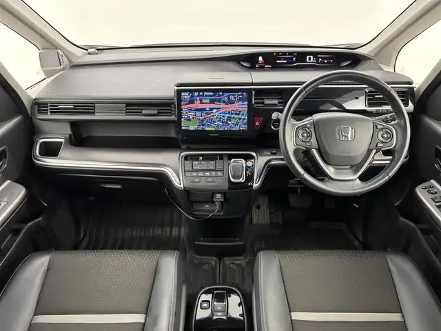 ホンダ ステップワゴン スパーダ eHEV G EXホンダS 福岡県 2021(令3)年 3.7万km プラチナホワイトパール 後席モニター　/社外10型ナビ/わくわくゲート　/ビルトインＥＴＣ２．０　/レーダークルーズコントロール　/ホンダセンシング　/衝突被害軽減ブレーキ　/レーンキープ　/先行車発進お知らせ　/標識認識機能　/両側電動スライドドア　/ハーフレザーシート　/シートヒーター　/純正16インチアルミホイール
