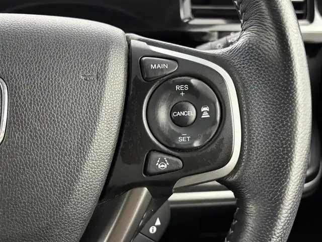 ホンダ ステップワゴン スパーダ eHEV G EXホンダS 福岡県 2021(令3)年 3.7万km プラチナホワイトパール 後席モニター　/社外10型ナビ/わくわくゲート　/ビルトインＥＴＣ２．０　/レーダークルーズコントロール　/ホンダセンシング　/衝突被害軽減ブレーキ　/レーンキープ　/先行車発進お知らせ　/標識認識機能　/両側電動スライドドア　/ハーフレザーシート　/シートヒーター　/純正16インチアルミホイール