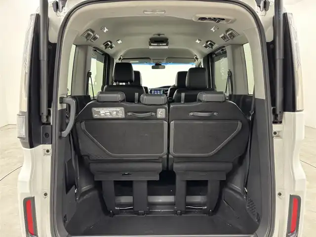 ホンダ ステップワゴン スパーダ eHEV G EXホンダS 福岡県 2021(令3)年 3.7万km プラチナホワイトパール 後席モニター　/社外10型ナビ/わくわくゲート　/ビルトインＥＴＣ２．０　/レーダークルーズコントロール　/ホンダセンシング　/衝突被害軽減ブレーキ　/レーンキープ　/先行車発進お知らせ　/標識認識機能　/両側電動スライドドア　/ハーフレザーシート　/シートヒーター　/純正16インチアルミホイール