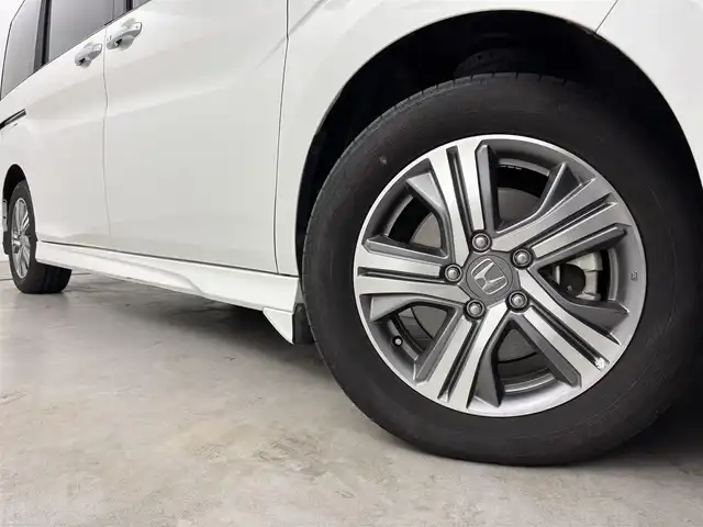 ホンダ ステップワゴン スパーダ eHEV G EXホンダS 福岡県 2021(令3)年 3.7万km プラチナホワイトパール 後席モニター　/社外10型ナビ/わくわくゲート　/ビルトインＥＴＣ２．０　/レーダークルーズコントロール　/ホンダセンシング　/衝突被害軽減ブレーキ　/レーンキープ　/先行車発進お知らせ　/標識認識機能　/両側電動スライドドア　/ハーフレザーシート　/シートヒーター　/純正16インチアルミホイール