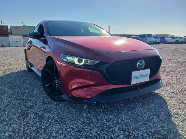 マツダ マツダ３ファストバック 20S 100周年特別記念車 宮崎県 2021(令3)年 4.4万km ソウルレッドクリスタルM 純正8.8型ナビ/フルセグTV/BOSEサウンドシステム/360度ビューモニター/ビルトインETC/レーダークルーズコントロール/前後パーキングセンサー/衝突被害軽減ブレーキ/車線逸脱防止支援システム/ブラインドスポットモニタリング/AT誤発進抑制/交通標識認識/ヘッドアップディスプレイ/LEDヘッドランプ/革巻きステアリング/ステアリングヒーター/パドルシフト/レッド革シート/前席シートヒーター/運転席パワーシート/純正18インチアルミホイール/スマートキー/プッシュエンジンスタート/禁煙車