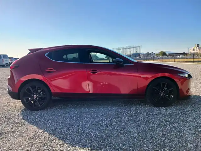 マツダ マツダ３ファストバック 20S 100周年特別記念車 宮崎県 2021(令3)年 4.4万km ソウルレッドクリスタルM 純正8.8型ナビ/フルセグTV/BOSEサウンドシステム/360度ビューモニター/ビルトインETC/レーダークルーズコントロール/前後パーキングセンサー/衝突被害軽減ブレーキ/車線逸脱防止支援システム/ブラインドスポットモニタリング/AT誤発進抑制/交通標識認識/ヘッドアップディスプレイ/LEDヘッドランプ/革巻きステアリング/ステアリングヒーター/パドルシフト/レッド革シート/前席シートヒーター/運転席パワーシート/純正18インチアルミホイール/スマートキー/プッシュエンジンスタート/禁煙車