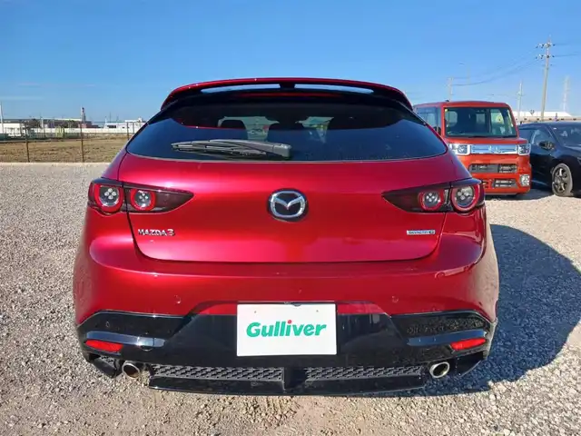 マツダ マツダ３ファストバック 20S 100周年特別記念車 宮崎県 2021(令3)年 4.4万km ソウルレッドクリスタルM 純正8.8型ナビ/フルセグTV/BOSEサウンドシステム/360度ビューモニター/ビルトインETC/レーダークルーズコントロール/前後パーキングセンサー/衝突被害軽減ブレーキ/車線逸脱防止支援システム/ブラインドスポットモニタリング/AT誤発進抑制/交通標識認識/ヘッドアップディスプレイ/LEDヘッドランプ/革巻きステアリング/ステアリングヒーター/パドルシフト/レッド革シート/前席シートヒーター/運転席パワーシート/純正18インチアルミホイール/スマートキー/プッシュエンジンスタート/禁煙車