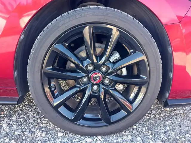 マツダ マツダ３ファストバック 20S 100周年特別記念車 宮崎県 2021(令3)年 4.4万km ソウルレッドクリスタルM 純正8.8型ナビ/フルセグTV/BOSEサウンドシステム/360度ビューモニター/ビルトインETC/レーダークルーズコントロール/前後パーキングセンサー/衝突被害軽減ブレーキ/車線逸脱防止支援システム/ブラインドスポットモニタリング/AT誤発進抑制/交通標識認識/ヘッドアップディスプレイ/LEDヘッドランプ/革巻きステアリング/ステアリングヒーター/パドルシフト/レッド革シート/前席シートヒーター/運転席パワーシート/純正18インチアルミホイール/スマートキー/プッシュエンジンスタート/禁煙車