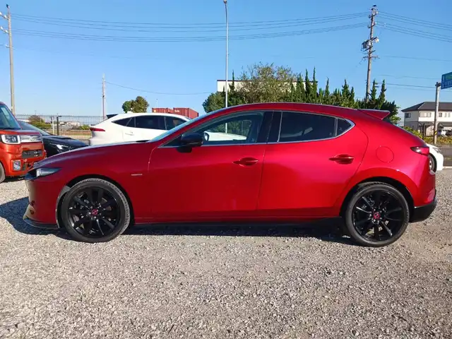 マツダ マツダ３ファストバック 20S 100周年特別記念車 宮崎県 2021(令3)年 4.4万km ソウルレッドクリスタルM 純正8.8型ナビ/フルセグTV/BOSEサウンドシステム/360度ビューモニター/ビルトインETC/レーダークルーズコントロール/前後パーキングセンサー/衝突被害軽減ブレーキ/車線逸脱防止支援システム/ブラインドスポットモニタリング/AT誤発進抑制/交通標識認識/ヘッドアップディスプレイ/LEDヘッドランプ/革巻きステアリング/ステアリングヒーター/パドルシフト/レッド革シート/前席シートヒーター/運転席パワーシート/純正18インチアルミホイール/スマートキー/プッシュエンジンスタート/禁煙車