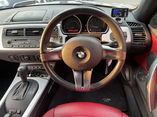 ＢＭＷ Ｚ４ ロードスター 2．5i 和歌山県 2006(平18)年 2.6万km チタンシルバーM 赤レザーシート/前席シートヒーター/HIDヘッドライト/社外フロントリップスポイラー/社外18インチアルミホイール/社外マフラー/ETC