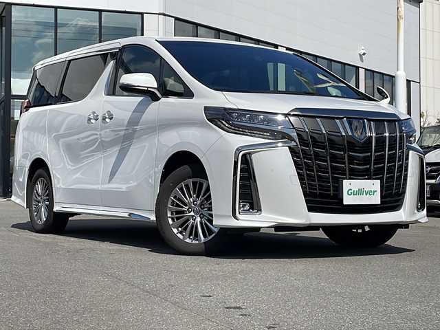 トヨタ アルファードハイブリット S タイプゴールドⅡ 青森県 2021(令3)年 6.2万km ホワイトパールクリスタルシャイン ・4WD/・トヨタセーフティセンス/・プリクラッシュセーフティ/・レーダークルーズコントロール/・レーンディパーチャーアラート/・オートハイビーム/・ブラインドスポットモニタリング/・前後クリアランスソナー/・純正メモリナビ/・フルセグ/・バックカメラ/・両側パワースライドドア/・パワーバックドア/・ハーフレザーシート/・オットマン/・LEDオートライト/・フォグランプ/・純正17インチアルミホイール/・アイドリングストップ/・100V電源/・ステアリングスイッチ/・デジタルインナーミラー/・スマートキー/・ビルトインETC2.0