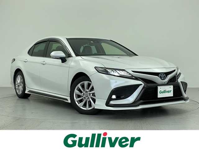 トヨタ カムリ WS 愛知県 2023(令5)年 1.2万km プラチナホワイトパールマイカ トヨタセーフティセンス/純正9型ディスプレイ/・フルセグTV/BTオーディオ/USB/全周囲カメラ/ドラレコ/ビルトインETC/BSM/HUD/GRエアロ(FSR)/JBLサウンド/ハーフレザーシート/パワーシートD席/LEDヘッドランプ/・フォグランプ/パドルシフト/純正フロアマット/ドアバイザー/スマートキー/純正アルミホイール