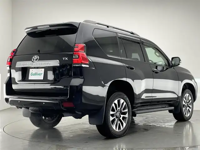 トヨタ ランドクルーザー プラド TX Lパッケージ 愛知県 2022(令4)年 1.8万km アティチュードブラックマイカ メーカー9型ＤＡナビ/ETC2.0/全方位カメラ/ベージュ内装/本革シート/パワーシート/7人乗り/サンルーフ/ルーフレール/19インチアルミホイール/スペアタイヤ/BSM/レーダークルーズコントロール/禁煙車