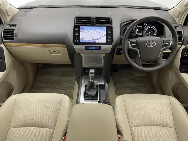 トヨタ ランドクルーザー プラド TX Lパッケージ 愛知県 2022(令4)年 1.8万km アティチュードブラックマイカ メーカー9型ＤＡナビ/ETC2.0/全方位カメラ/ベージュ内装/本革シート/パワーシート/7人乗り/サンルーフ/ルーフレール/19インチアルミホイール/スペアタイヤ/BSM/レーダークルーズコントロール/禁煙車