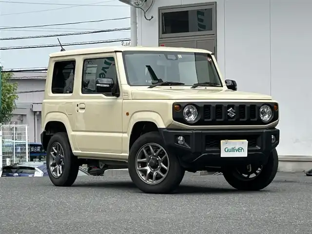 スズキ ジムニー XC 宮城県 2023(令5)年 1.3万km シフォンアイボリーM ワンオーナー/４WD/クルーズコントロール/車線逸脱警報システム/衝突被害軽減装置/ヒルディセントコントロール/ミラーヒーター/シートヒーター/ヘッドライトウォッシャー/オートライト/LEDライト/ETC/保証書/サマータイヤ純正AW（１７５/80R16）５ｍｍ