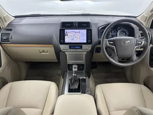 トヨタ ランドクルーザー プラド TX Lパッケージ 福井県 2023(令5)年 1.8万km ホワイトパールクリスタルシャイン 純正ディスプレイオーディオ/アラウンドビューモニター/スペアキー/サンルーフ/モデリスタエアロ（フロント＆リア）/純正１９インチＯＰアルミホイール/寒冷地仕様/ニュートラルベージュシート/シートヒーター＆ベンチレーション/ルーフレール/ドラレコ前後（SD欠）/保証書＆取説/純正ビルトインETC
