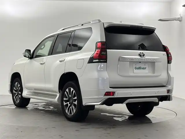 トヨタ ランドクルーザー プラド TX Lパッケージ 福井県 2023(令5)年 1.8万km ホワイトパールクリスタルシャイン 純正ディスプレイオーディオ/アラウンドビューモニター/スペアキー/サンルーフ/モデリスタエアロ（フロント＆リア）/純正１９インチＯＰアルミホイール/寒冷地仕様/ニュートラルベージュシート/シートヒーター＆ベンチレーション/ルーフレール/ドラレコ前後（SD欠）/保証書＆取説/純正ビルトインETC