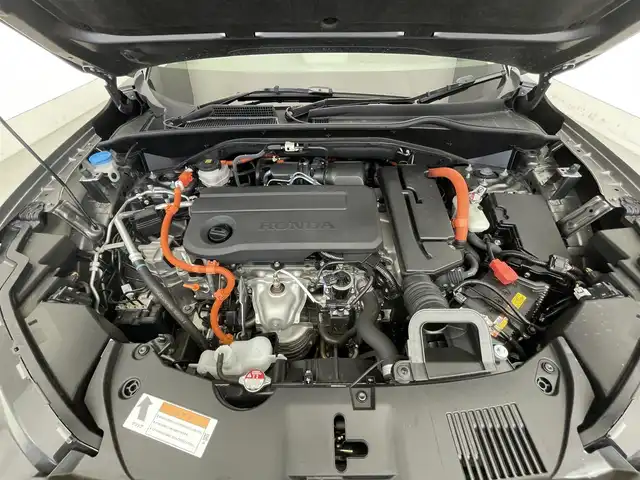 ホンダ ＺＲ－Ｖ ハイブリッド e:HEV Z 滋賀県 2023(令5)年 1.8万km スーパープラチナグレーメタリック ９インチホンダコネクトナビ/Bluetooth/フルセグTV/ホンダセンシング/渋滞追従機能付きアダプティブクルーズコントロール/車線維持支援システム/衝突被害軽減ブレーキ/路外逸脱抑制機能/標識認識機能/ブラインドスポットインフォメーション/パーキングセンサーシステム/後退出庫サポート/BOSEスピーカー/パドルシフト/全方位カメラ/純正ETC2.0/ワイヤレス充電/オートホールド/パワーシート/シートヒーター/ステアリングヒーター/パワーバックドア/LEDヘッドライト