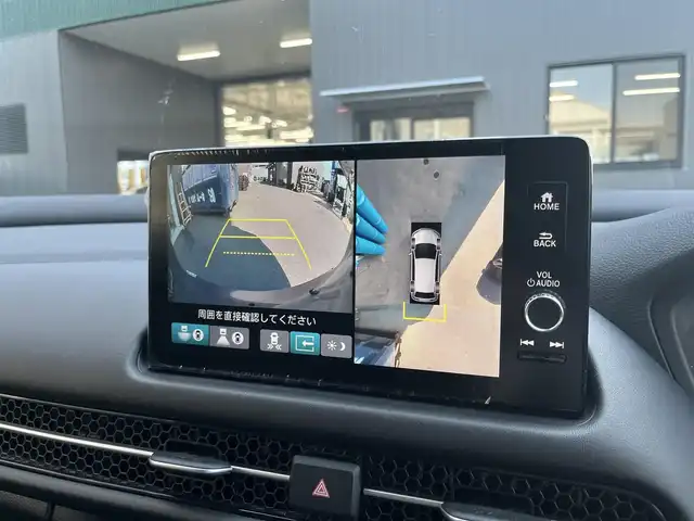 ホンダ ＺＲ－Ｖ ハイブリッド e:HEV Z 滋賀県 2023(令5)年 1.8万km スーパープラチナグレーメタリック ９インチホンダコネクトナビ/Bluetooth/フルセグTV/ホンダセンシング/渋滞追従機能付きアダプティブクルーズコントロール/車線維持支援システム/衝突被害軽減ブレーキ/路外逸脱抑制機能/標識認識機能/ブラインドスポットインフォメーション/パーキングセンサーシステム/後退出庫サポート/BOSEスピーカー/パドルシフト/全方位カメラ/純正ETC2.0/ワイヤレス充電/オートホールド/パワーシート/シートヒーター/ステアリングヒーター/パワーバックドア/LEDヘッドライト