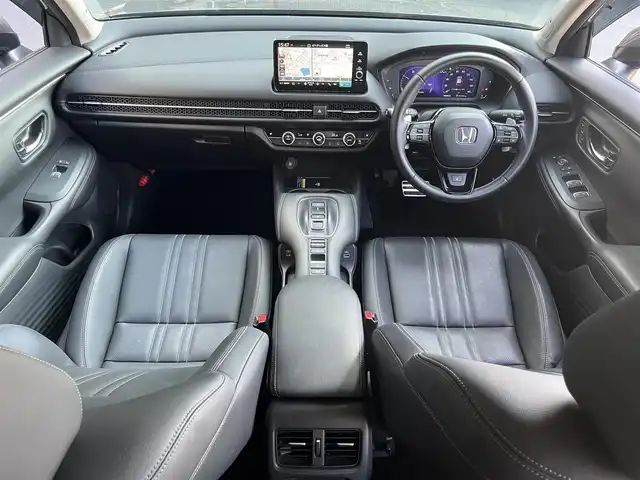 ホンダ ＺＲ－Ｖ ハイブリッド e:HEV Z 滋賀県 2023(令5)年 1.8万km スーパープラチナグレーメタリック ９インチホンダコネクトナビ/Bluetooth/フルセグTV/ホンダセンシング/渋滞追従機能付きアダプティブクルーズコントロール/車線維持支援システム/衝突被害軽減ブレーキ/路外逸脱抑制機能/標識認識機能/ブラインドスポットインフォメーション/パーキングセンサーシステム/後退出庫サポート/BOSEスピーカー/パドルシフト/全方位カメラ/純正ETC2.0/ワイヤレス充電/オートホールド/パワーシート/シートヒーター/ステアリングヒーター/パワーバックドア/LEDヘッドライト