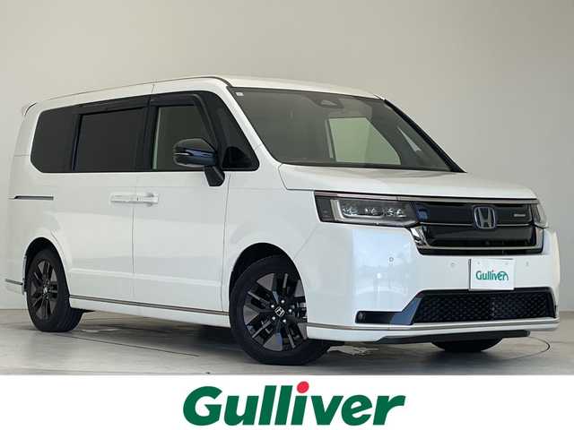 ホンダ ステップワゴン スパーダ eHEV 愛知県 2024(令6)年 2.1万km プラチナホワイトパール 純正11.4型ナビ/無限フロントグリル/フリップダウンモニター/全方位カメラ/両側パワースライドドア/レーダークルーズコントロール/シートヒーター/バックカメラ/電動リアゲート/コーナーセンサー/純正アルミホイール/ブラインドスポットモニター/パドルシフト/LEDヘッドライト/インテリジェントミラー/リアオートエアコン/オートマチックハイビーム/ドライブレコーダー/ETC/衝突軽減システム/フルセグ/CD DVD/Bluetooth/ステアリングスイッチ/スマートキー/プッシュスタート