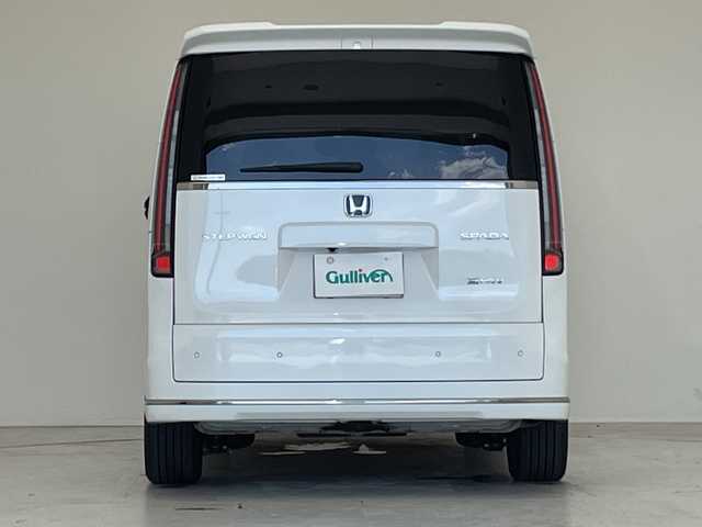 ホンダ ステップワゴン スパーダ eHEV 愛知県 2024(令6)年 2.1万km プラチナホワイトパール 純正11.4型ナビ/無限フロントグリル/フリップダウンモニター/全方位カメラ/両側パワースライドドア/レーダークルーズコントロール/シートヒーター/バックカメラ/電動リアゲート/コーナーセンサー/純正アルミホイール/ブラインドスポットモニター/パドルシフト/LEDヘッドライト/インテリジェントミラー/リアオートエアコン/オートマチックハイビーム/ドライブレコーダー/ETC/衝突軽減システム/フルセグ/CD DVD/Bluetooth/ステアリングスイッチ/スマートキー/プッシュスタート