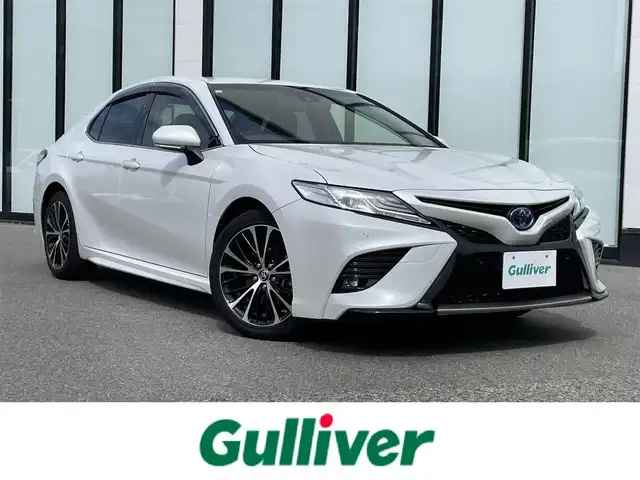 トヨタ カムリ WSレザーパッケージ 大阪府 2020(令2)年 6.5万km プラチナホワイトパールマイカ ワンオーナー　/純正８インチディスプレイオーディオ　/   フルセグＴＶ/Bluetooth/USB　/バックモニター/クリアランスソナー/ブラインドスポットモニター　/ヘッドアップディスプレイ/トヨタセーフティセンス　/前席シートヒーター　/パドルシフト　/前席パワーシート/レザーシート/前後ドライブレコーダー/純正18インチアルミホイール/純正フロアマット　/ビルトインＥＴＣ　/ＬＥＤ
