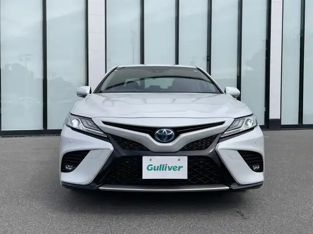 トヨタ カムリ WSレザーパッケージ 大阪府 2020(令2)年 6.5万km プラチナホワイトパールマイカ ワンオーナー　/純正８インチディスプレイオーディオ　/   フルセグＴＶ/Bluetooth/USB　/バックモニター/クリアランスソナー/ブラインドスポットモニター　/ヘッドアップディスプレイ/トヨタセーフティセンス　/前席シートヒーター　/パドルシフト　/前席パワーシート/レザーシート/前後ドライブレコーダー/純正18インチアルミホイール/純正フロアマット　/ビルトインＥＴＣ　/ＬＥＤ