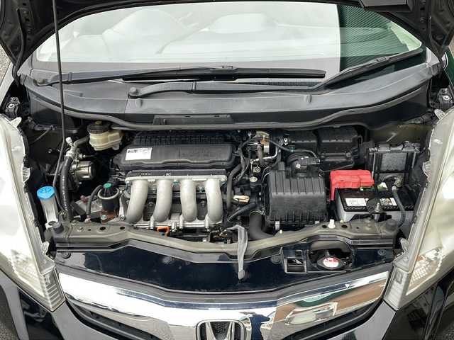 ホンダ フィット X 岐阜県 2010(平22)年 10.1万km クリスタルブラックパール 禁煙車/AM/FM/CD/DVD/USB/SD/純正ナビ/ワンセグTV/クルーズコントロール/シートヒーター/ビルトインETC/純正フロアマット/盗難防止/電動調整ミラー/ヘッドライトレベライザー/オートエアコン/プッシュスタート/ドアバイザー/スマートキー