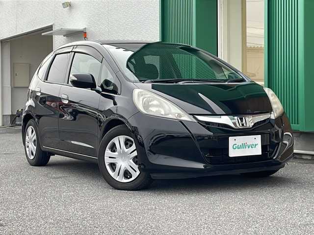 ホンダ フィット X 岐阜県 2010(平22)年 10.1万km クリスタルブラックパール 禁煙車/AM/FM/CD/DVD/USB/SD/純正ナビ/ワンセグTV/クルーズコントロール/シートヒーター/ビルトインETC/純正フロアマット/盗難防止/電動調整ミラー/ヘッドライトレベライザー/オートエアコン/プッシュスタート/ドアバイザー/スマートキー