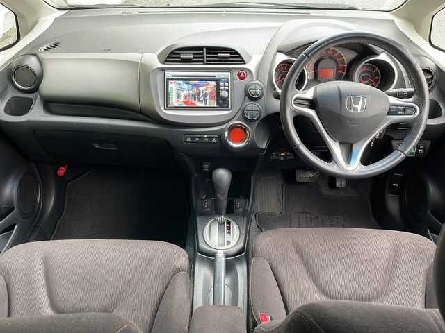 ホンダ フィット X 岐阜県 2010(平22)年 10.1万km クリスタルブラックパール 禁煙車/AM/FM/CD/DVD/USB/SD/純正ナビ/ワンセグTV/クルーズコントロール/シートヒーター/ビルトインETC/純正フロアマット/盗難防止/電動調整ミラー/ヘッドライトレベライザー/オートエアコン/プッシュスタート/ドアバイザー/スマートキー