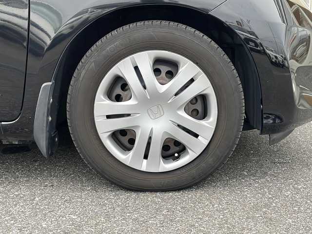 ホンダ フィット X 岐阜県 2010(平22)年 10.1万km クリスタルブラックパール 禁煙車/AM/FM/CD/DVD/USB/SD/純正ナビ/ワンセグTV/クルーズコントロール/シートヒーター/ビルトインETC/純正フロアマット/盗難防止/電動調整ミラー/ヘッドライトレベライザー/オートエアコン/プッシュスタート/ドアバイザー/スマートキー