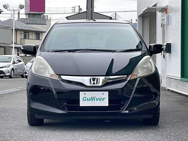 ホンダ フィット X 岐阜県 2010(平22)年 10.1万km クリスタルブラックパール 禁煙車/AM/FM/CD/DVD/USB/SD/純正ナビ/ワンセグTV/クルーズコントロール/シートヒーター/ビルトインETC/純正フロアマット/盗難防止/電動調整ミラー/ヘッドライトレベライザー/オートエアコン/プッシュスタート/ドアバイザー/スマートキー