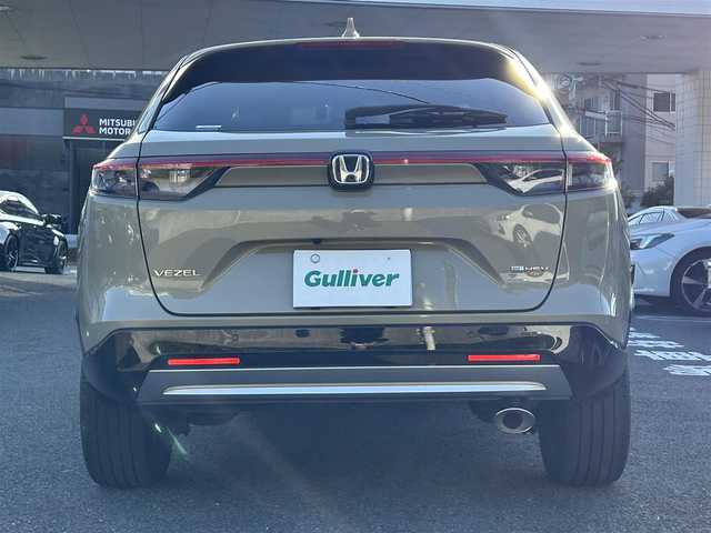ホンダ ヴェゼル ハイブリッド e:HEV Z 長崎県 2024(令6)年 3.5万km ベージュ プッシュスタート/純正ナビ付ディスプレイオーディオ（AM/FM/USB/TV)/電子パーキングブレーキ/ビルトインETC2.0/USB×２/ブレーキホールド/ドライブレコーダー（前後）/パドルシフト/シートヒーター（前席）/ハンドルヒーター/ブラインドスポットモニター/クルーズコントロール（追従あり）/レーンキープアシスト/ブルートゥース/コーナーセンサー（前後）/カーテンエアバッグ/パワーバックドア/LEDライト/フォグランプ