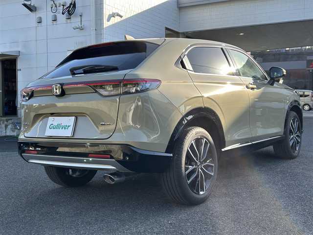 ホンダ ヴェゼル ハイブリッド e:HEV Z 長崎県 2024(令6)年 3.5万km ベージュ プッシュスタート/純正ナビ付ディスプレイオーディオ（AM/FM/USB/TV)/電子パーキングブレーキ/ビルトインETC2.0/USB×２/ブレーキホールド/ドライブレコーダー（前後）/パドルシフト/シートヒーター（前席）/ハンドルヒーター/ブラインドスポットモニター/クルーズコントロール（追従あり）/レーンキープアシスト/ブルートゥース/コーナーセンサー（前後）/カーテンエアバッグ/パワーバックドア/LEDライト/フォグランプ