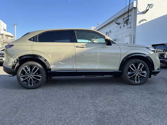 ホンダ ヴェゼル ハイブリッド e:HEV Z 長崎県 2024(令6)年 3.5万km ベージュ プッシュスタート/純正ナビ付ディスプレイオーディオ（AM/FM/USB/TV)/電子パーキングブレーキ/ビルトインETC2.0/USB×２/ブレーキホールド/ドライブレコーダー（前後）/パドルシフト/シートヒーター（前席）/ハンドルヒーター/ブラインドスポットモニター/クルーズコントロール（追従あり）/レーンキープアシスト/ブルートゥース/コーナーセンサー（前後）/カーテンエアバッグ/パワーバックドア/LEDライト/フォグランプ