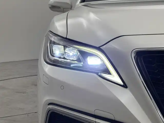 トヨタ クラウン ハイブリッド RS アドバンス 福岡県 2020(令2)年 3.8万km ホワイトパールクリスタルシャイン ムーンルーフ　/純正ナビ／フルセグＴＶ　/バックカメラ　/ＥＴＣ２．０　/レーダークルーズコントロール　/コーナーセンサー　/トヨタセーフティセンス　/衝突軽減ブレーキ　/レーンキープ　/ブラインドスポットモニター　/アクセル踏み間違い防止　/ヘッドアップディスプレイ　/パドルシフト　/シートヒーター　/ステアリングヒーター　/ハーフレザーシート　/シートメモリー付きパワーシート　/LEDヘッドライト　/純正１８インチアルミホイール