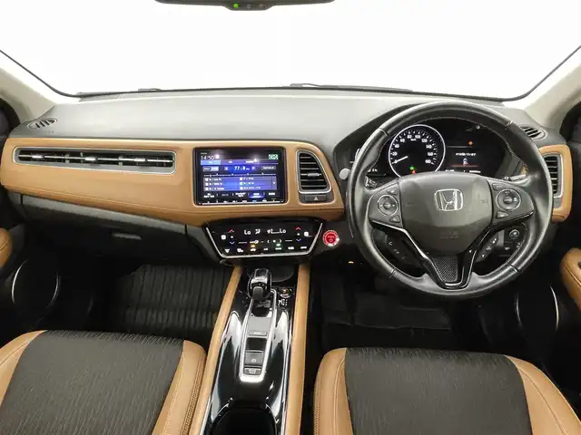 ホンダ ヴェゼル ハイブリッド Z ホンダセンシング 熊本県 2018(平30)年 6.1万km プラチナホワイトパール ワンオーナー　/禁煙車　/純正ナビ（ＣＤ・ＤＶＤ・フルセグ・ＢＴ・ＳＤ・ＵＳＢ・HDMI）/バックカメラ　/ビルトインＥＴＣ　/社外前方ドライブレコーダー　/レーダークルーズコントロール/前後クリアランスソナー　/前席シートヒーター/ハーフレザーシート/純正フロアマット/純正１７インチAW/オートライト/LEDヘッドライト/フォグライト/スマートキー/プッシュスタート/スペアキー1本/保証書/取扱説明書