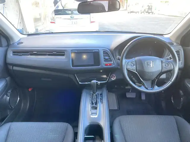 ホンダ ヴェゼル X 長崎県 2015(平27)年 15.3万km ホワイトオーキッドパール 衝突被害軽減ブレーキ/メーカーOPナビ/・Bluetooth接続/・フルセグTV/・DVD再生/バックカメラ/ビルトインETC/クルーズコントロール/革巻きステアリング/ステアリングスイッチ/電子パーキング/オートホールド機能/ECON/ISOFIX/LEDオートヘッドライト/USB接続/HDIM接続