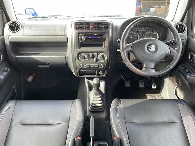 スズキ ジムニー クロスアドベンチャー XC 道北・旭川 2012(平24)年 10.2万km パールメタリックカシミールブルー /禁煙車//社外オーディオ//ＵＳＢ・ＡＵＸ//ハーフレザーシート//Ｄ席シートヒーター//ミラーヒーター//ヘッドライトレベライザー//フォグライト//スペアキー//ＥＴＣ//保証書