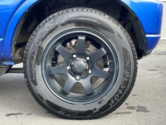 スズキ ジムニー クロスアドベンチャー XC 道北・旭川 2012(平24)年 10.2万km パールメタリックカシミールブルー /禁煙車//社外オーディオ//ＵＳＢ・ＡＵＸ//ハーフレザーシート//Ｄ席シートヒーター//ミラーヒーター//ヘッドライトレベライザー//フォグライト//スペアキー//ＥＴＣ//保証書