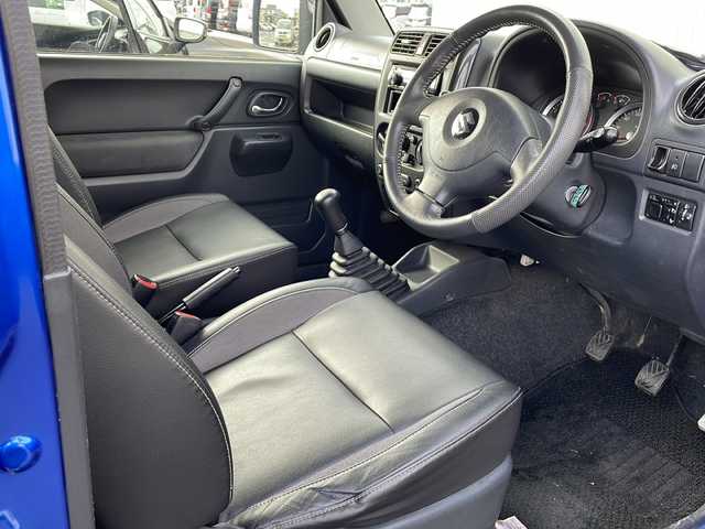 スズキ ジムニー クロスアドベンチャー XC 道北・旭川 2012(平24)年 10.2万km パールメタリックカシミールブルー /禁煙車//社外オーディオ//ＵＳＢ・ＡＵＸ//ハーフレザーシート//Ｄ席シートヒーター//ミラーヒーター//ヘッドライトレベライザー//フォグライト//スペアキー//ＥＴＣ//保証書