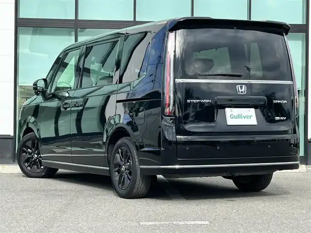ホンダ ステップワゴン スパーダ eHEV 和歌山県 2023(令5)年 1.3万km クリスタルブラックパール 純正ナビ/全方位モニター/フルセグTV/両側パワースライドドア/衝突軽減ブレーキ/アダプティブクルーズコントロール/コーナーセンサー/パワーテールゲート/シートヒーター/純正アルミホイール/純正フロアマット/ビルトインETC/ドライブレコーダー/LEDヘッドライト/オートライト