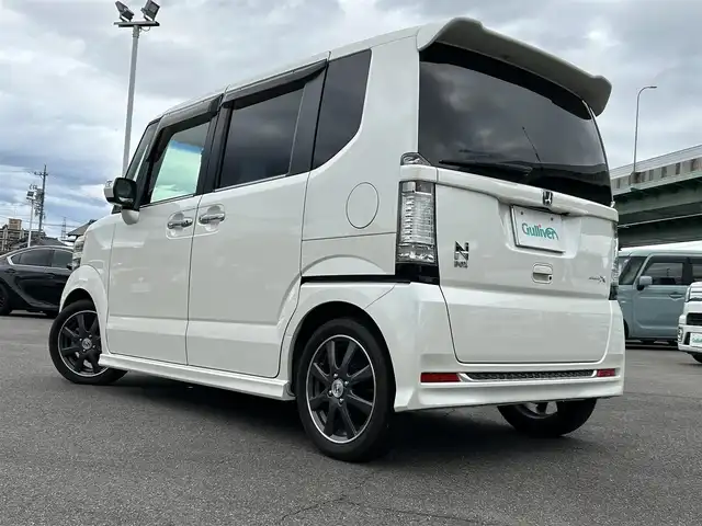 ホンダ Ｎ ＢＯＸ 2トーン モデューロXGターボPKG 愛知県 2013(平25)年 6.9万km プレミアムホワイトパール メモリーナビ/（FM/AM/BT/CD/DVD/SD)/バックカメラ/ドライブレコーダー/ETC/両側パワースライドドア/純正15インチAW/ステアリングスィッチ/パドルシフト/ウィンカードアミラー/HIDヘッドライト/フォグランプ/ドアバイザー