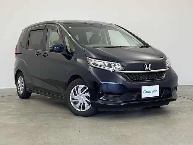 ホンダ フリード G ホンダセンシング 新潟県 2020(令2)年 2.9万km ミッドナイトブルービームM 純正9インチメモリナビ/（BT/FM/AM/フルセグTV）/バックカメラ/ステアリングスイッチ/両側パワースライド/前後ドライブレコーダー/シートヒーター/ワイパーデアイサー/サンシェード/電格ミラー/ウィンカーミラー/ドアバイザー/ETC/取扱説明書